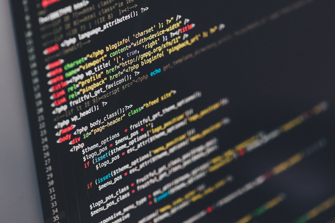 Developer workspace with code on screen — building the product
